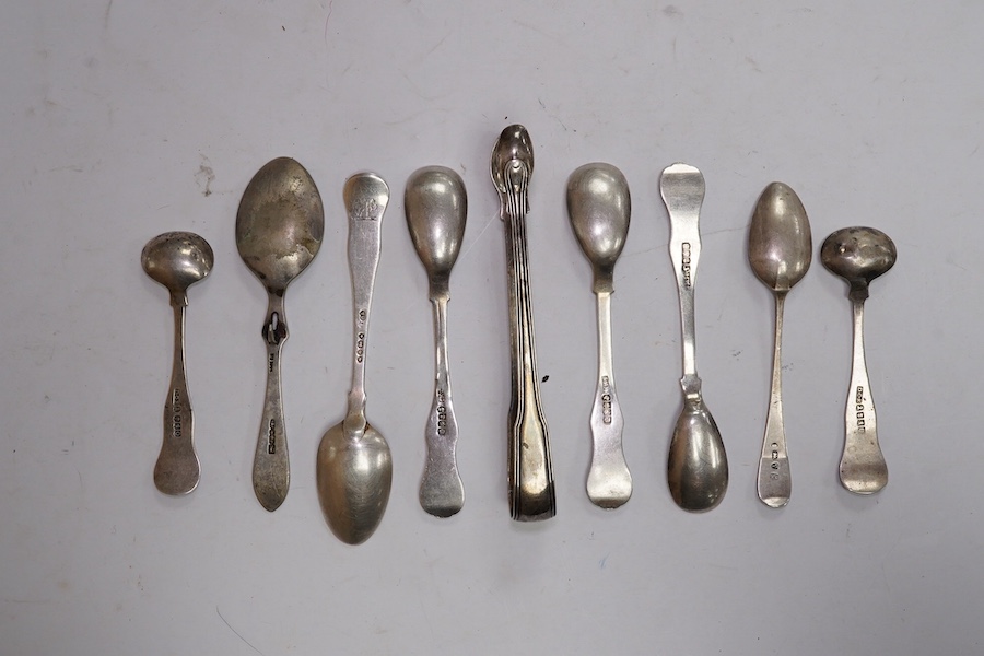 Five assorted 19th century Scottish silver condiment spoons, various dates and makers, a pair of George III silver sugar tongs, two other small silver spoons, 4.9oz and a silver plated preserve spoon. Condition - poor to